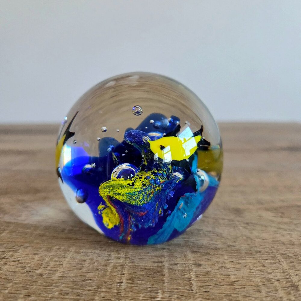 Handblown glass paperweight with underwater seascape design Murano style.